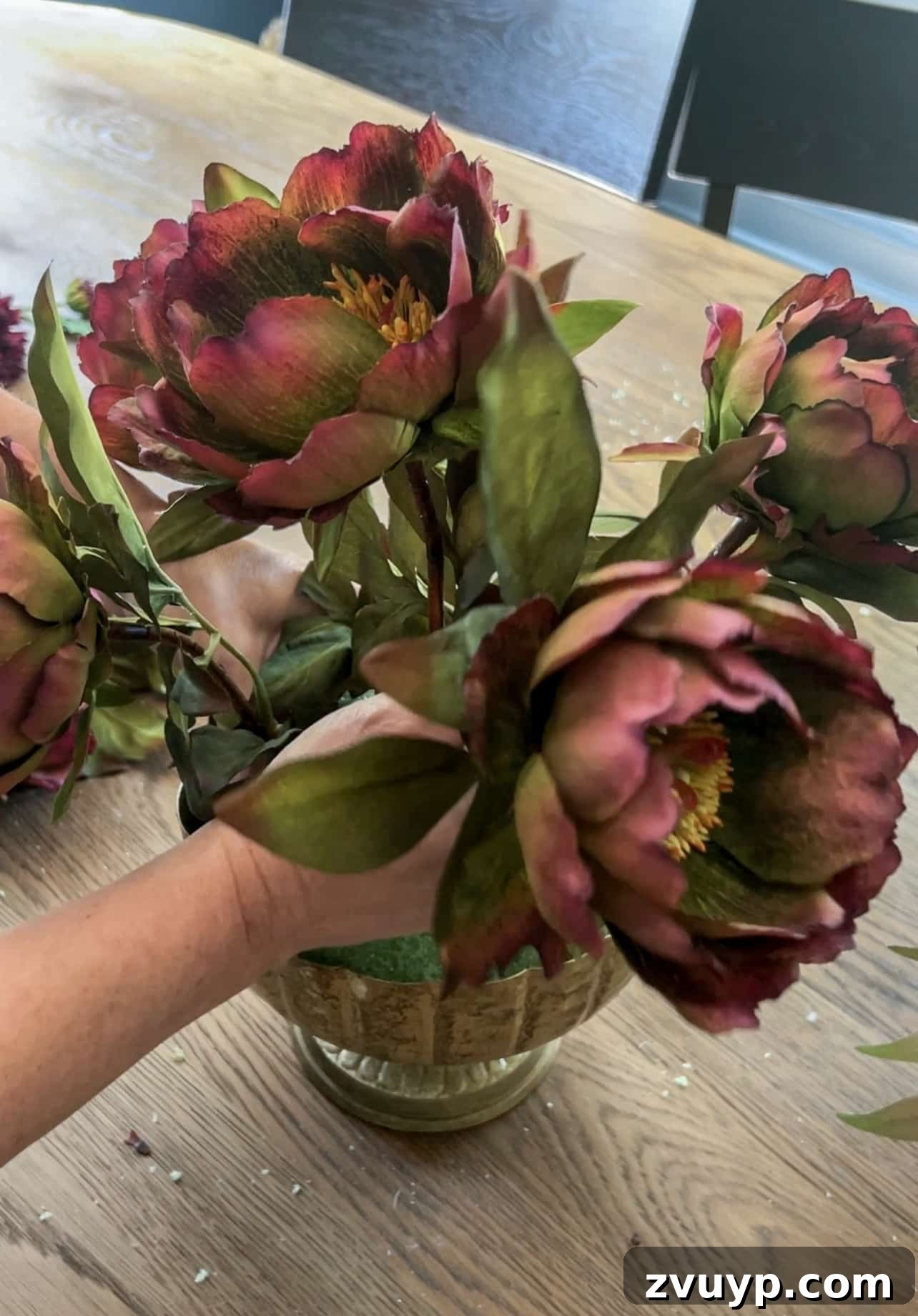 Autumn Blooms: Simple DIY Floral Arrangements 7 Using purple and green peonies to frame the central focal point in a fall floral arrangement