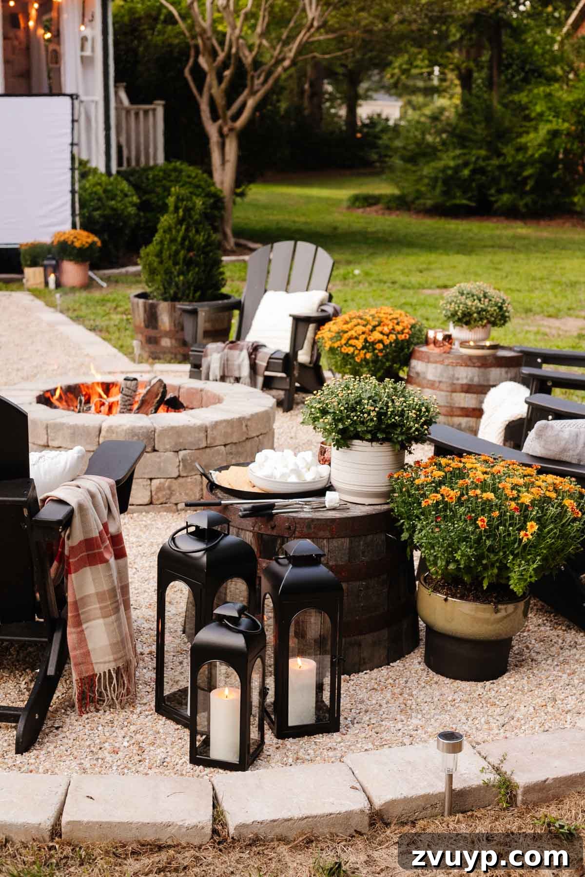 Fireside Fantasies: How to Host a Bonfire Party They'll Never Forget 4 fall bonfire party with s'mores, blankets, and lanterns