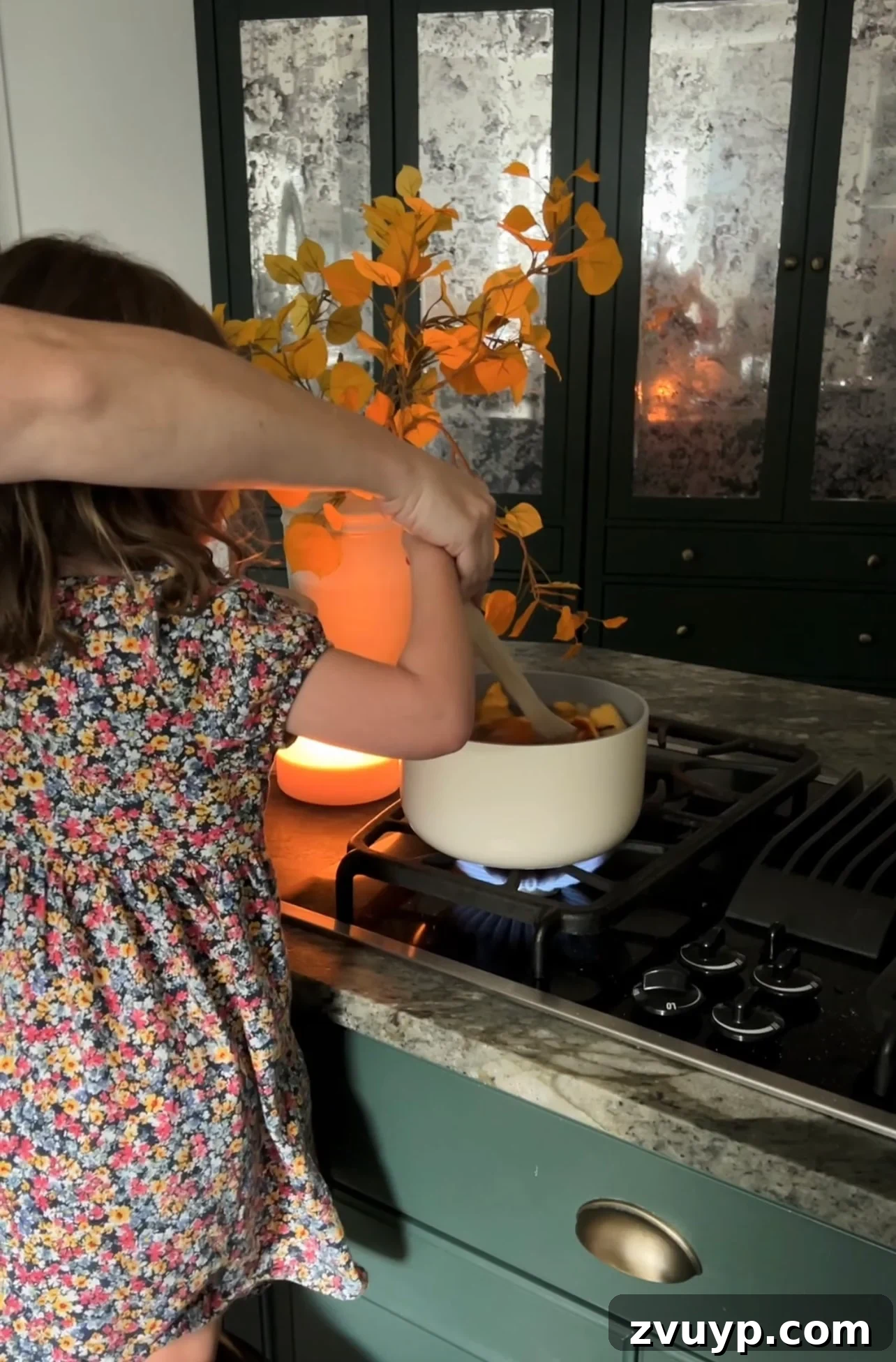 Sustainable Autumn Simmering Potpourri 7 stirring a pot of fall stovetop potpourri