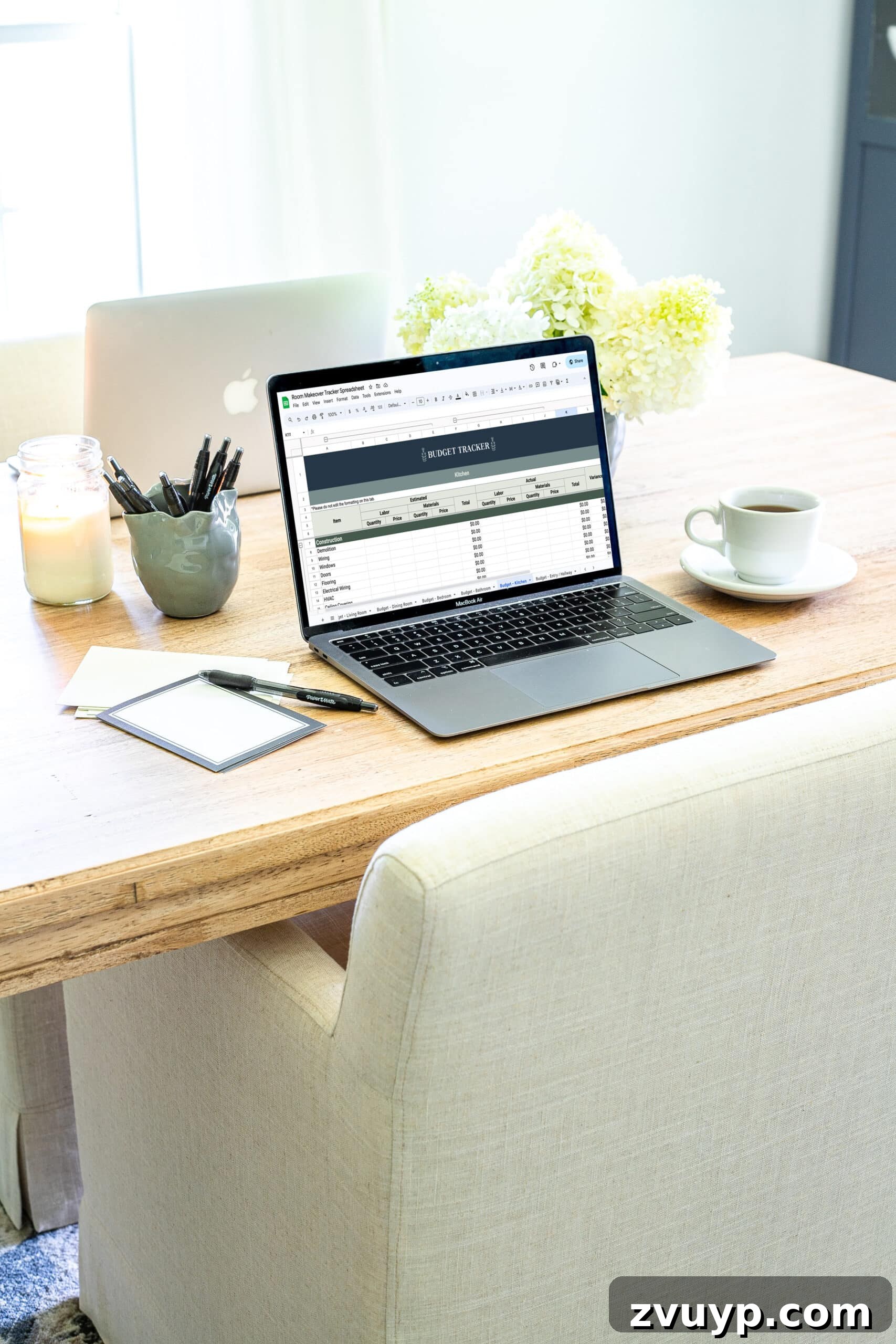 Craft Your Perfect Room 3 Tools for Makeover Mastery 5 laptop with remodel budget tracking spreadsheet