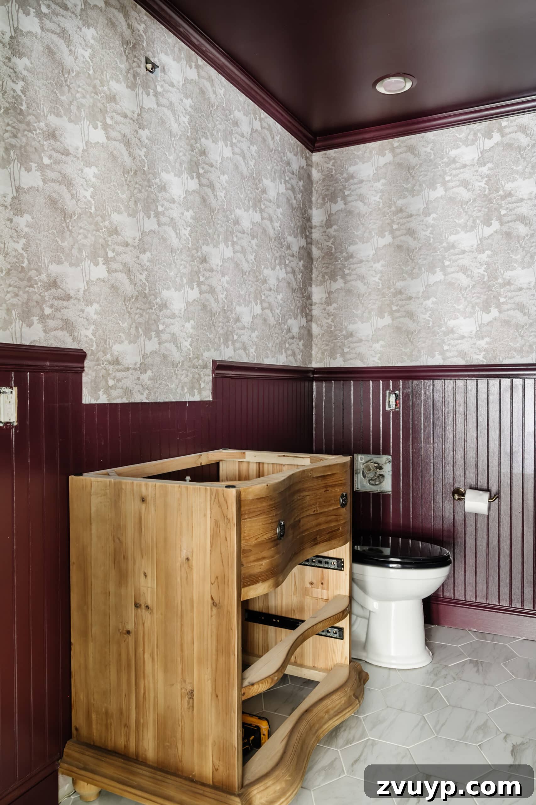 Chic Modern French Toile Wall Decor 2 Farrow & Ball Brinjal paint with modern toile wallpaper Saint Sebastian in a powder room