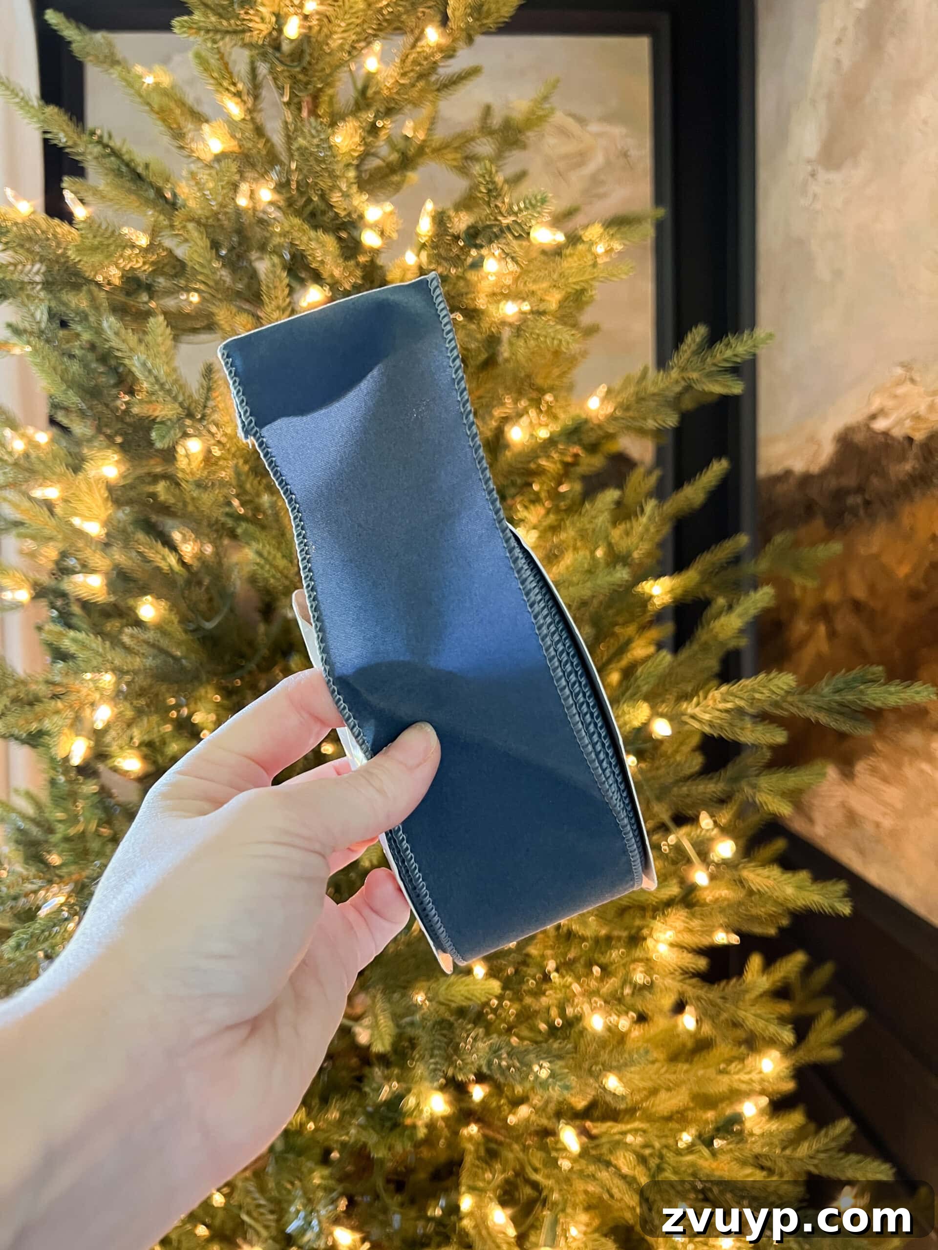 Craft Your Own Stunning Christmas Mantel Garland 21 Vibrant wired blue ribbon, perfect for crafting structured bows and decorations with lasting shape.