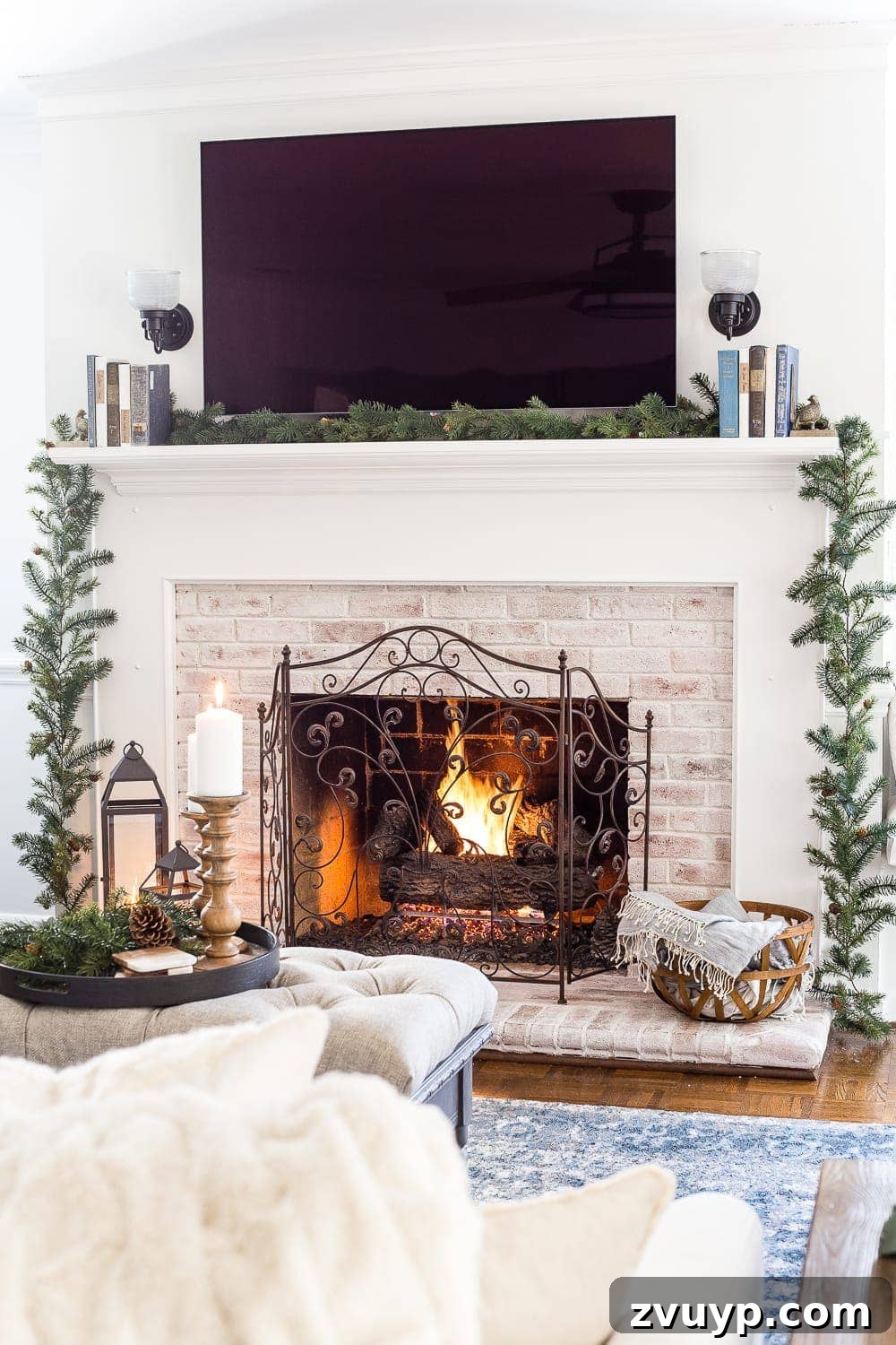 Craft Your Own Stunning Christmas Mantel Garland 4 Simple winter mantel featuring books and a minimalist pine garland, showcasing the elegant foundation.