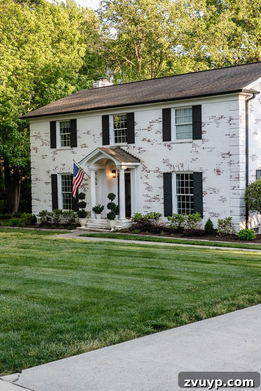 From Patchy to Pristine Our One-Year Front Yard Makeover 12 plush green lawn makeover with mowed stripes