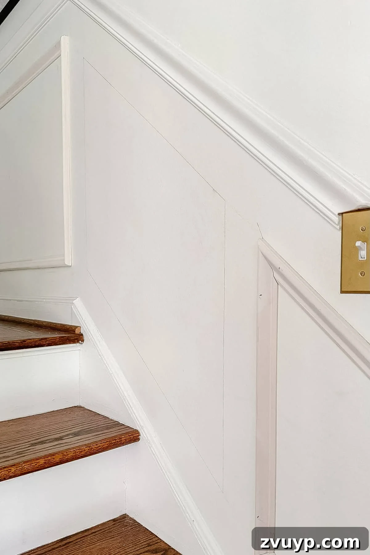 Transform Your Stairs: Effortless DIY Wainscoting Guide 4 Pencil markings on stairs to guide molding placement