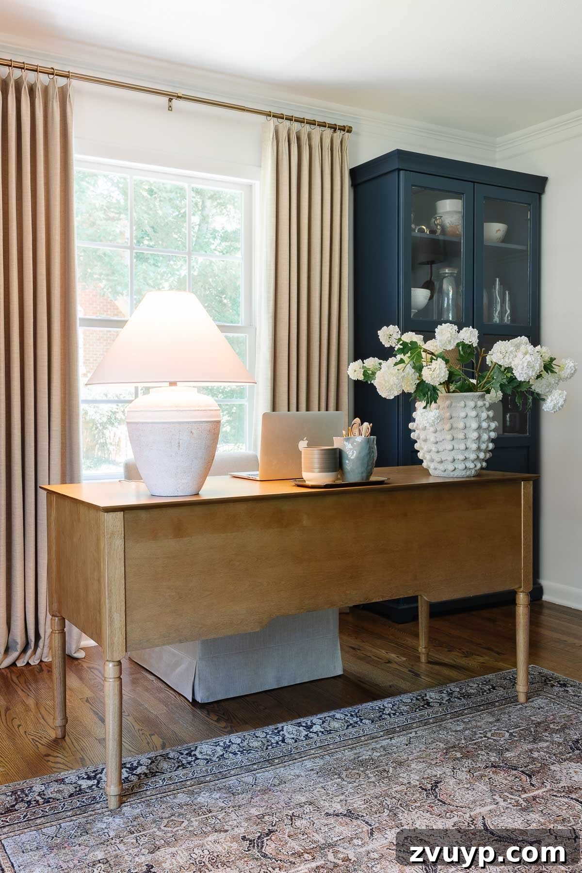 Power Up Your Productivity: Smart Home Office Layouts 8 Efficient home office desk setup for working with clients, featuring balanced lighting and a professional aesthetic.