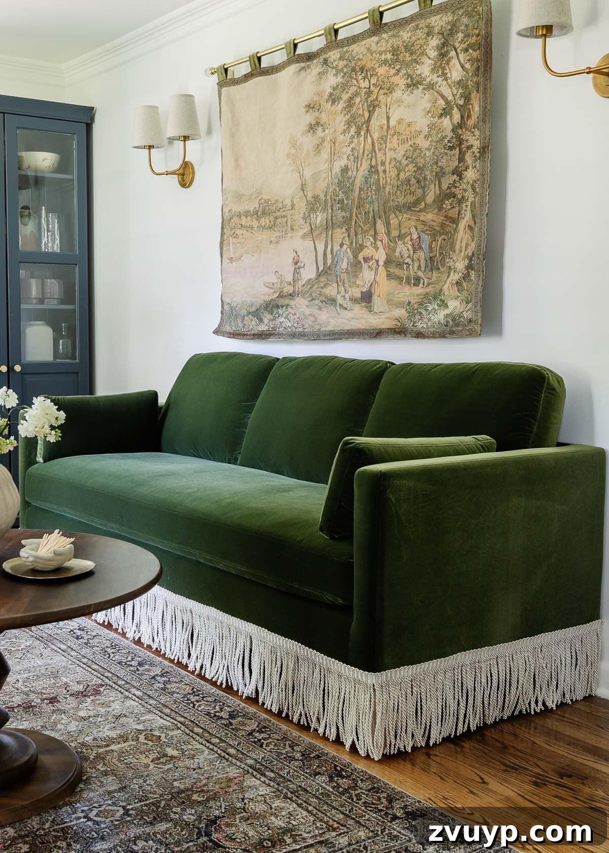 Instant Chic: DIY Fringe Trim for Your Seating 6 green velvet fringe sofa styled in an elegant office
