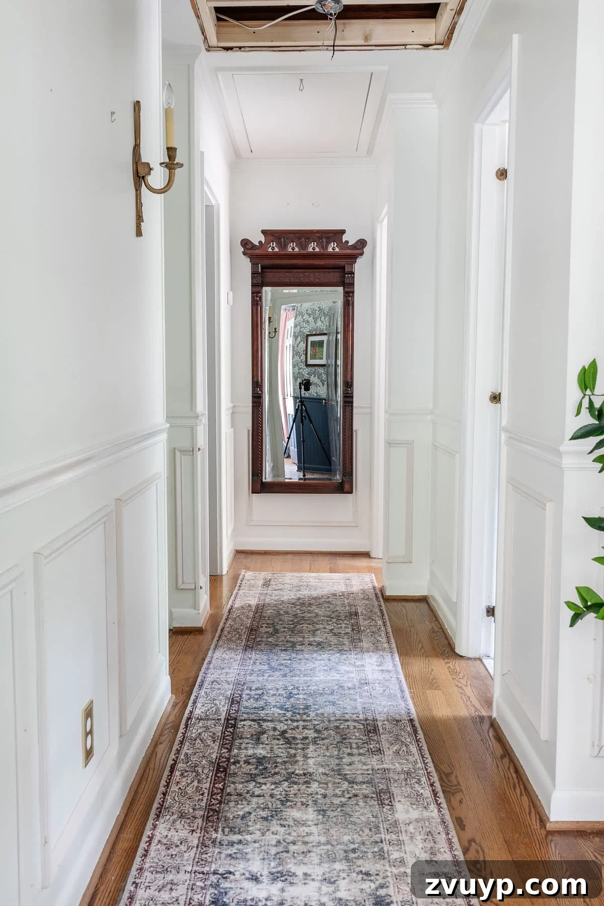 8 Brilliant Solutions to Transform Your Popcorn Ceiling (No Demo Needed) 6 patching a ceiling in a hallway, demonstrating preparation for covering textured ceilings