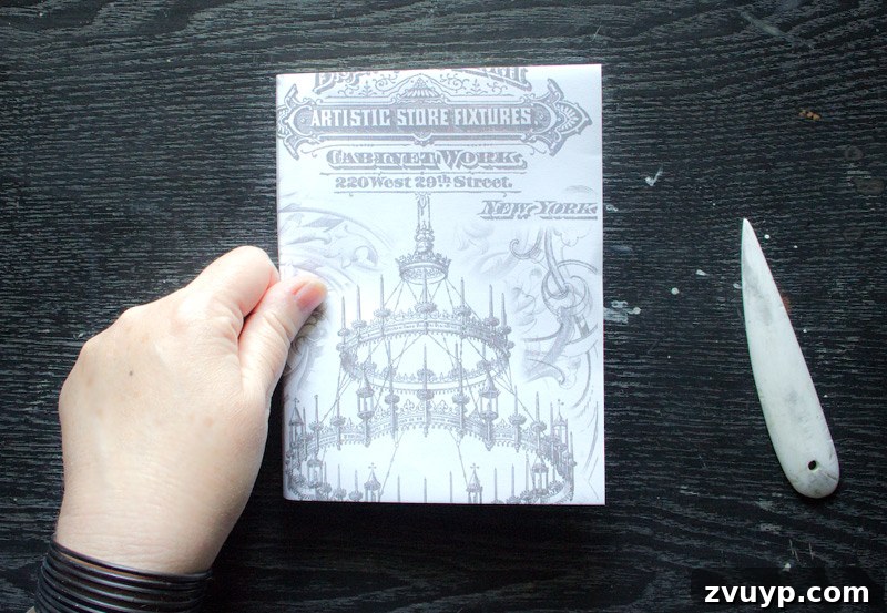 Wrapping book with paper - Creating soft creases along the spine edges