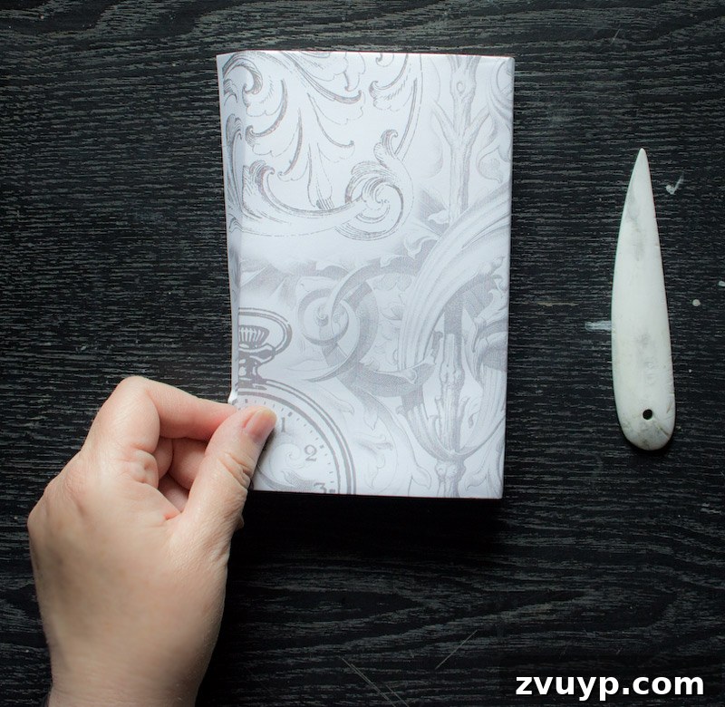 Flap fold placement - Repeating the creasing process for the back cover flap