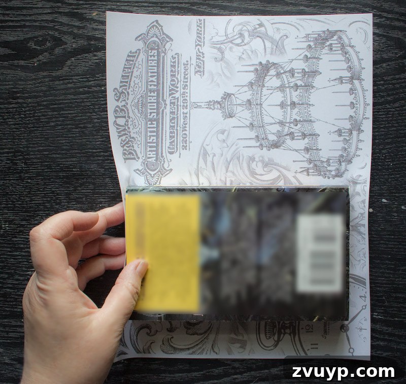Covering book - Folding the top edge of the paper