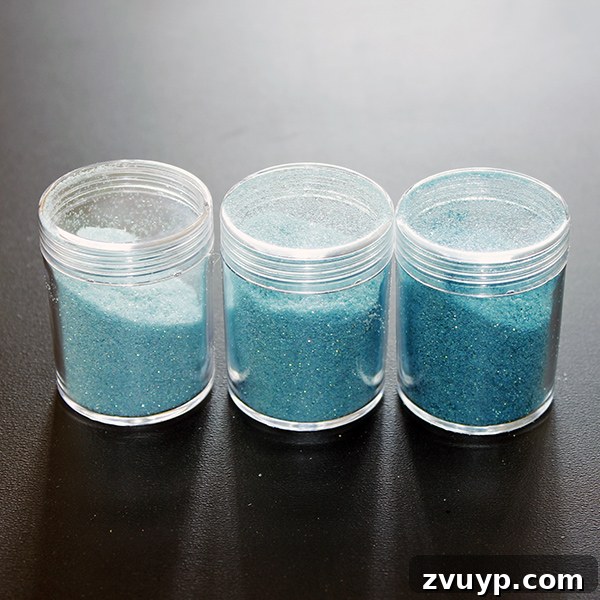 Shimmering aqua custom colored glitter, ready for various craft projects.