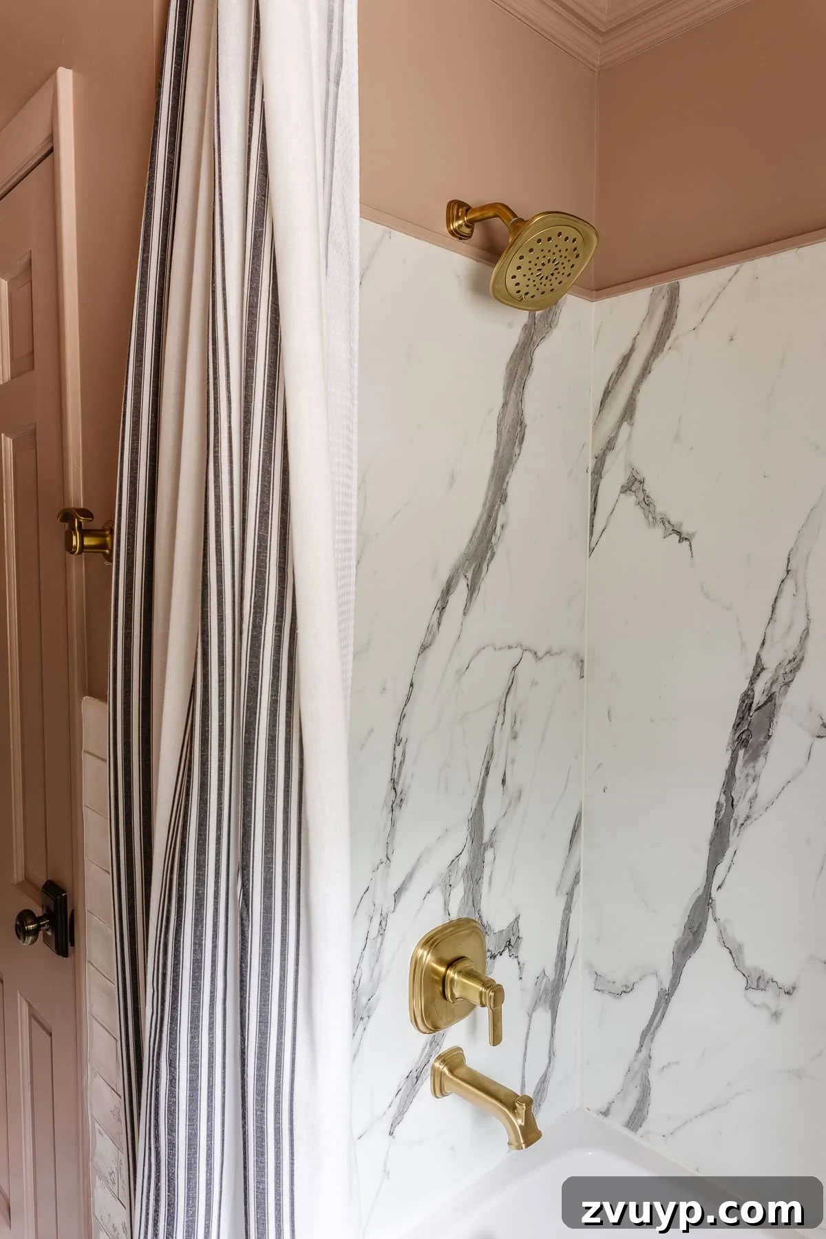 Hang Your Extra Long Shower Curtain Like a Pro 9 A beautifully installed extra long shower curtain in a black and pink bathroom, showcasing the final, steamed look.