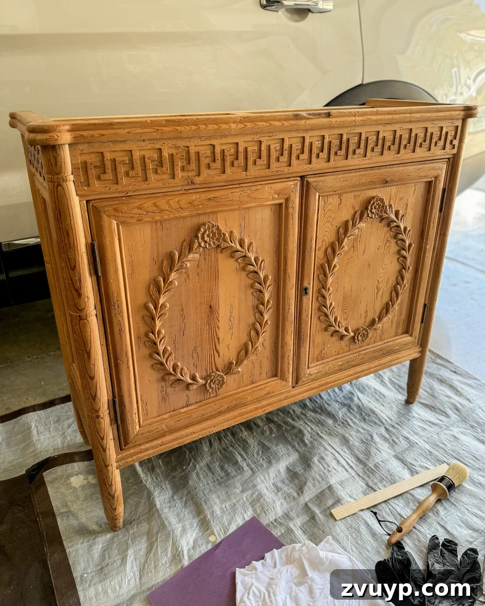 No-Sand Furniture Transformation: Stain Over Stain 2 Foyer cabinet with its original orange wood stain before applying gel stain for makeover