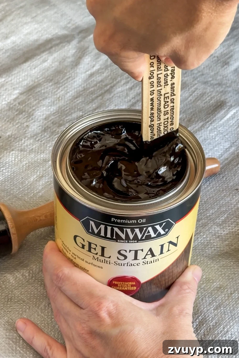No-Sand Furniture Transformation: Stain Over Stain 7 Stirring Minwax gel stain to ensure consistent color and proper consistency