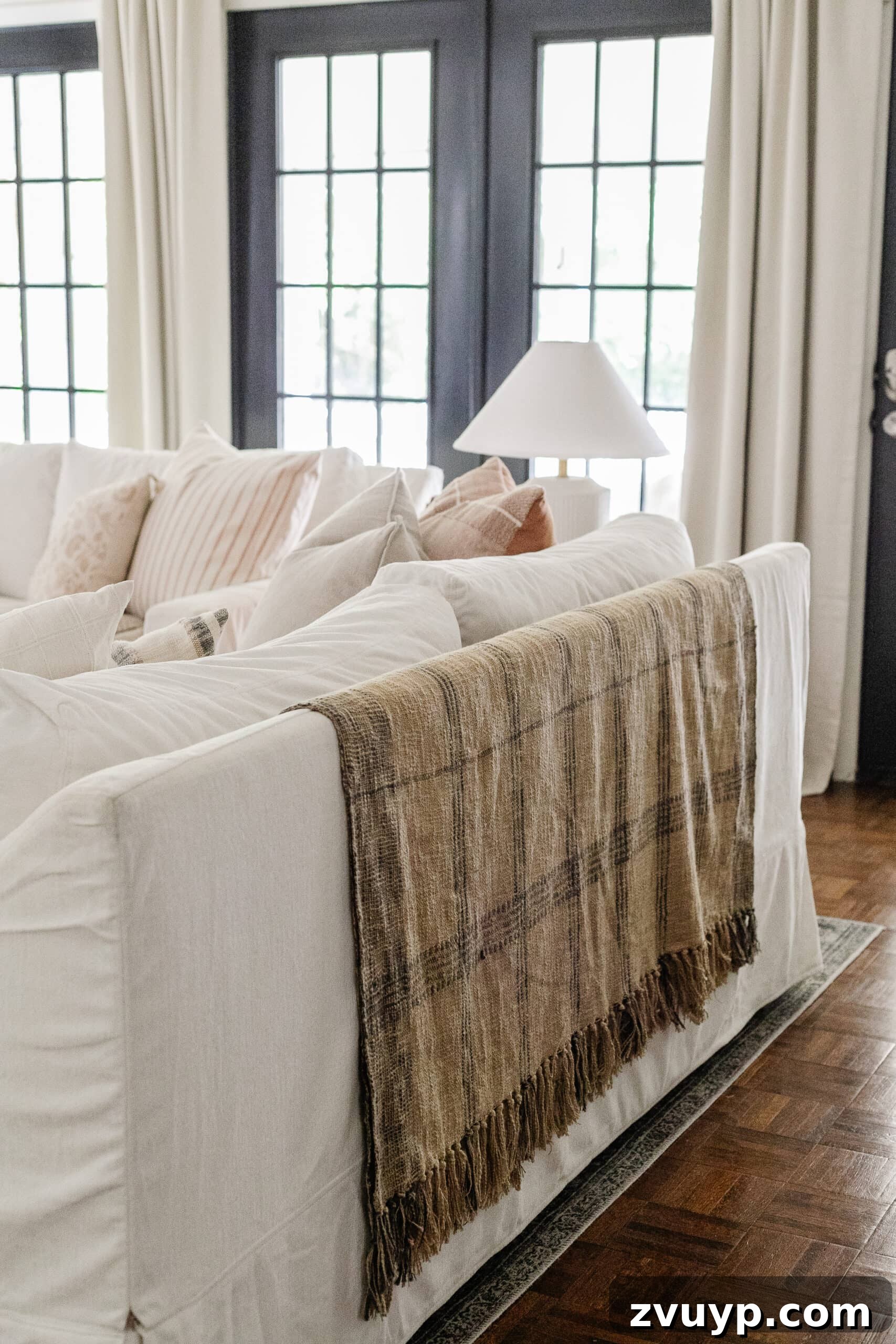 13 Ingenious Fabric Upcycles for Stylish Homes 4 throw blanket to cover a sofa back