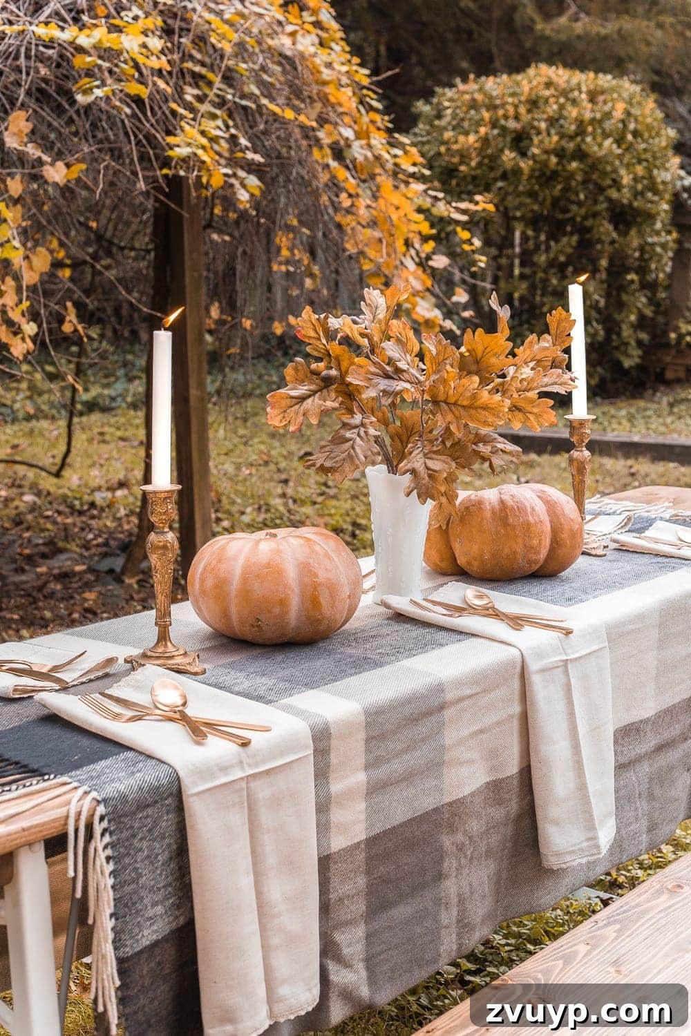 13 Ingenious Fabric Upcycles for Stylish Homes 5 throw blanket used as a tablecloth for fall decor