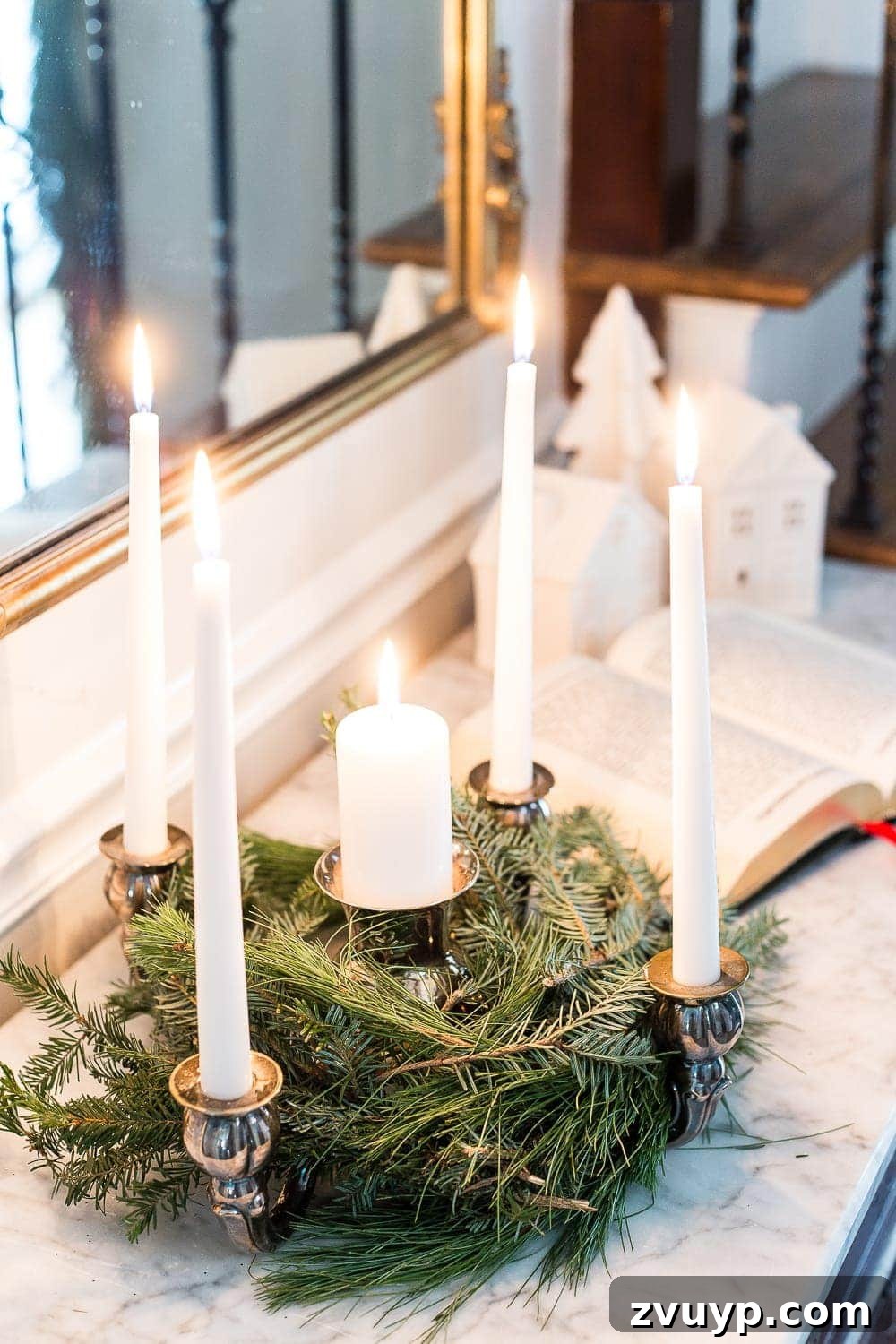 18 Charming Natural Christmas Decorations You Can Make 10 An elegant Advent candle holder adorned with real pine branches, a beautiful natural Christmas decor piece.