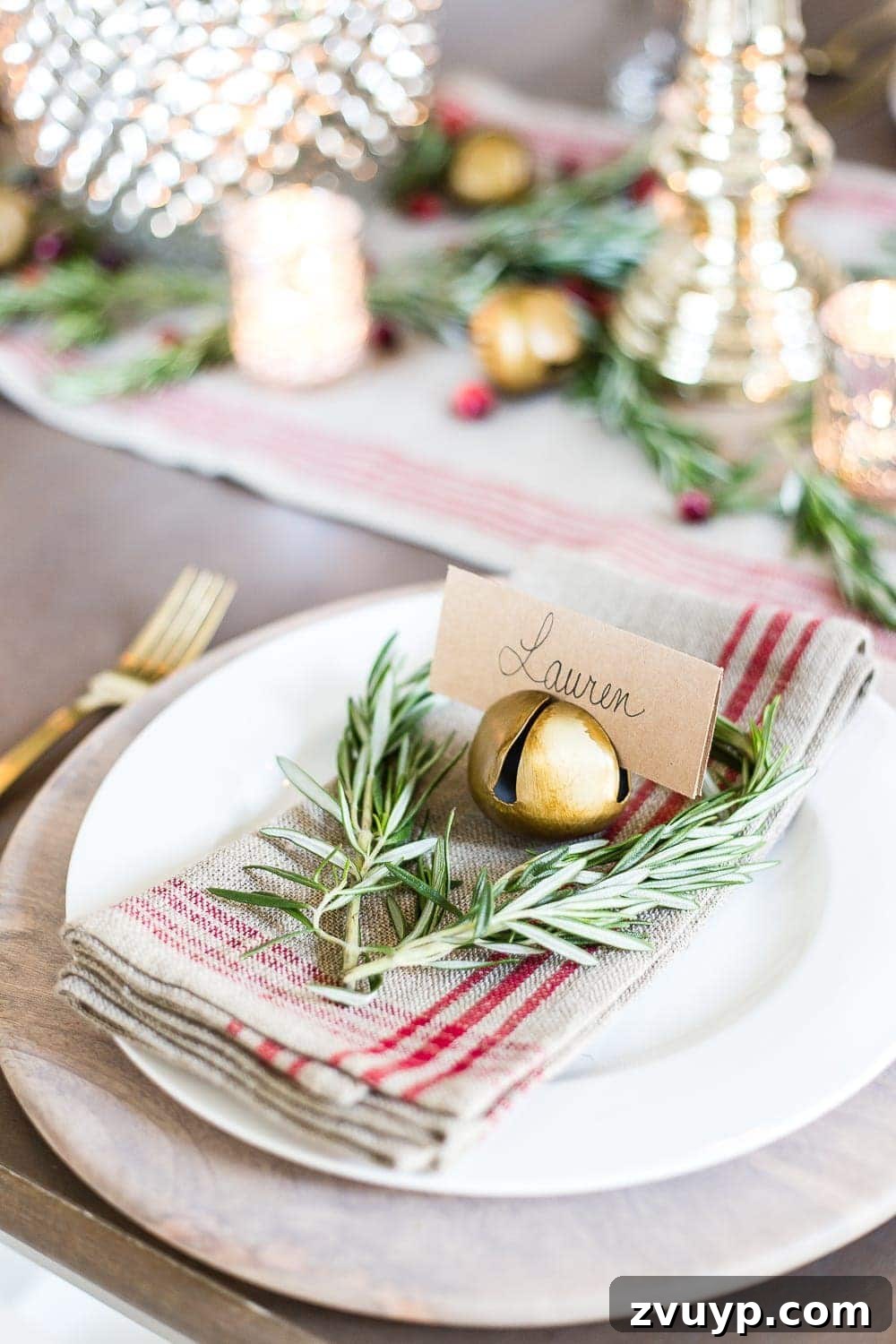 18 Charming Natural Christmas Decorations You Can Make 12 A charming rosemary heart mini wreath on a place setting for a Christmas table, an elegant natural decor detail.