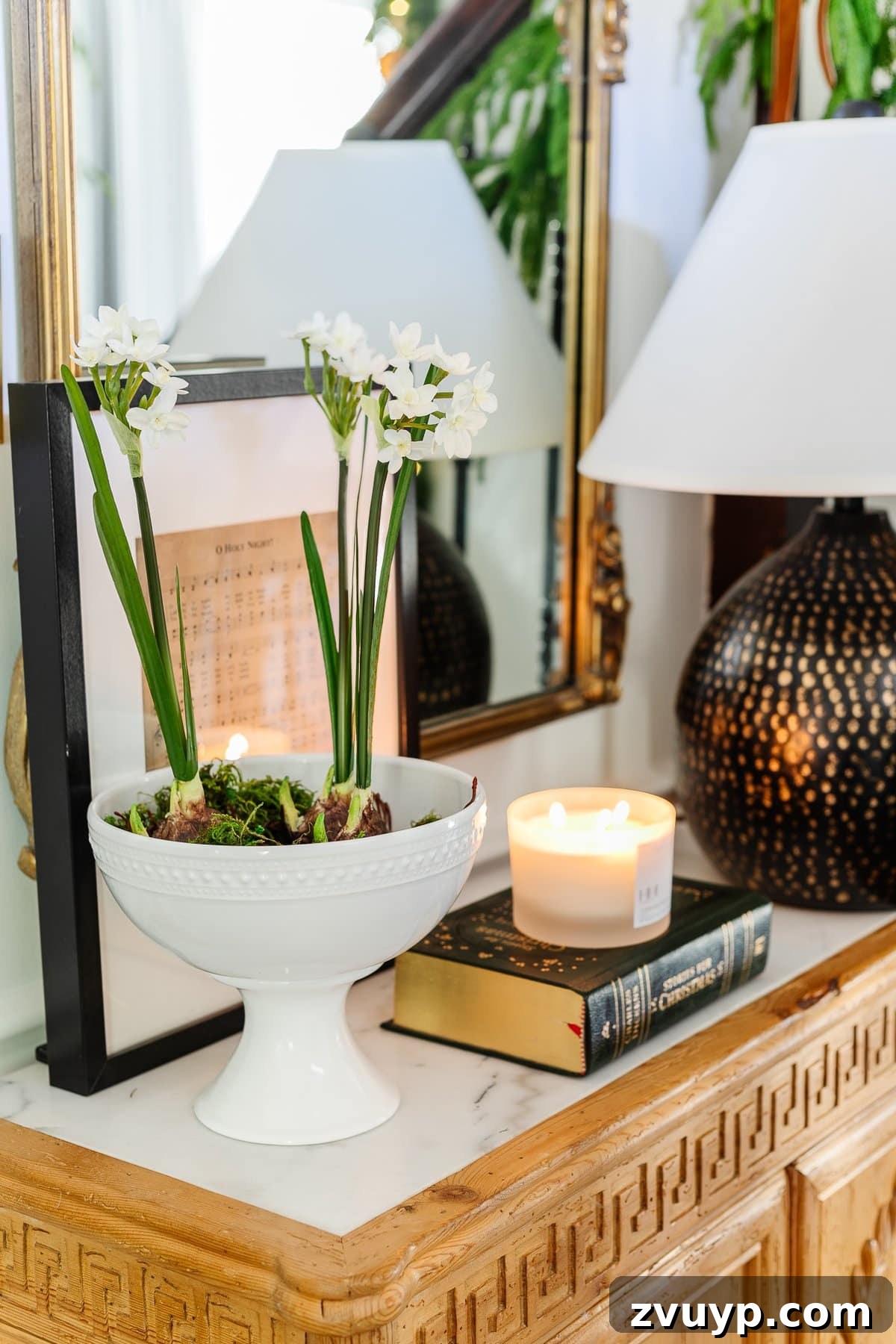 18 Charming Natural Christmas Decorations You Can Make 4 A beautiful bowl of paperwhite flowers on an entryway table, ideal for natural Christmas decor.