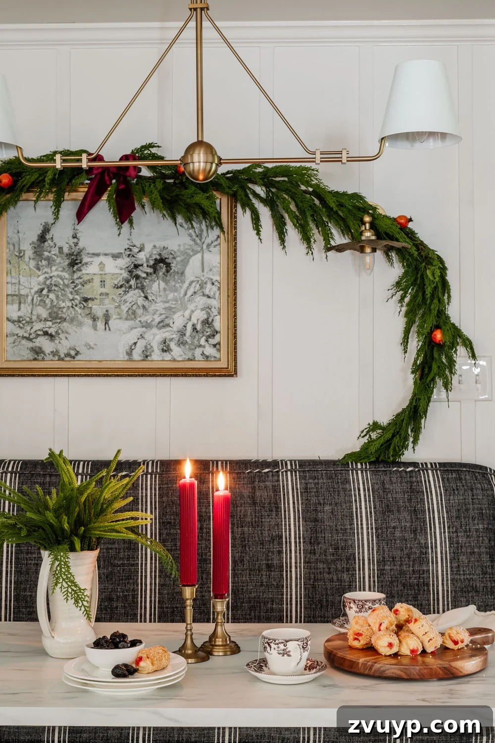 Beyond Believable: Crafting and Perfecting Your Faux Garland 4 realistic garland around a picture frame for breakfast nook dining room Christmas decor
