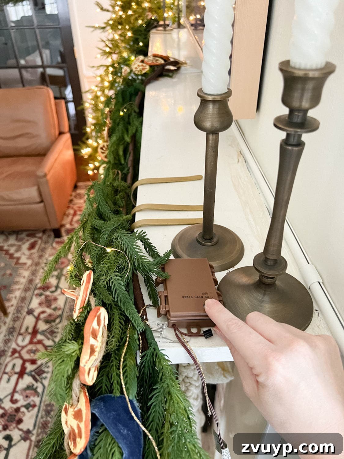 Beyond Believable: Crafting and Perfecting Your Faux Garland 8 how to put lights on unlit garland using command strips and battery pack
