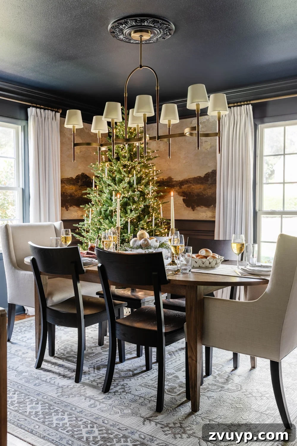 Effortless Holiday Dining Room Styling 2 navy blue dining room decorated for Christmas with mural walls