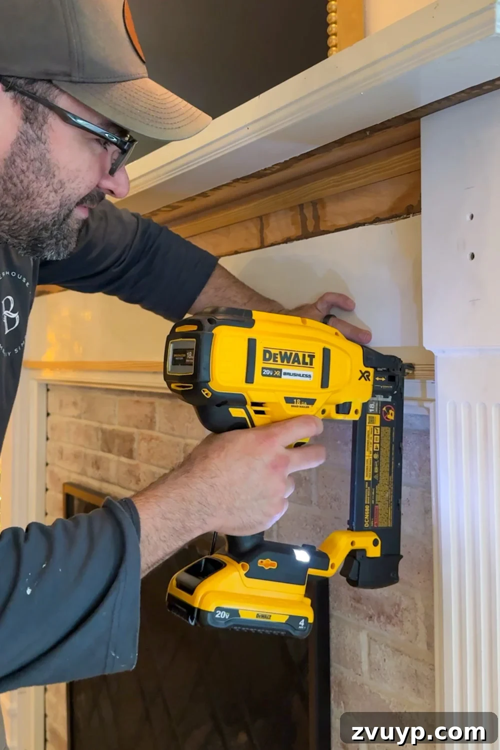Achieve Timeless Elegance DIY Fireplace Molding Makeover 12 attaching 1x board to fireplace with nail gun