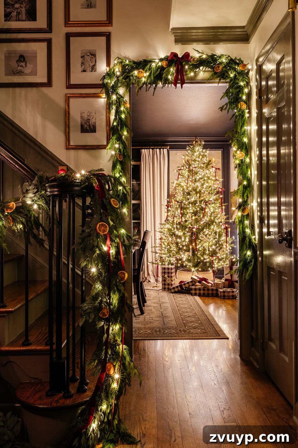 Flickering Lights Virtual Christmas Home Experience 2024 8 candlelight Christmas tour doorway with garland around tree