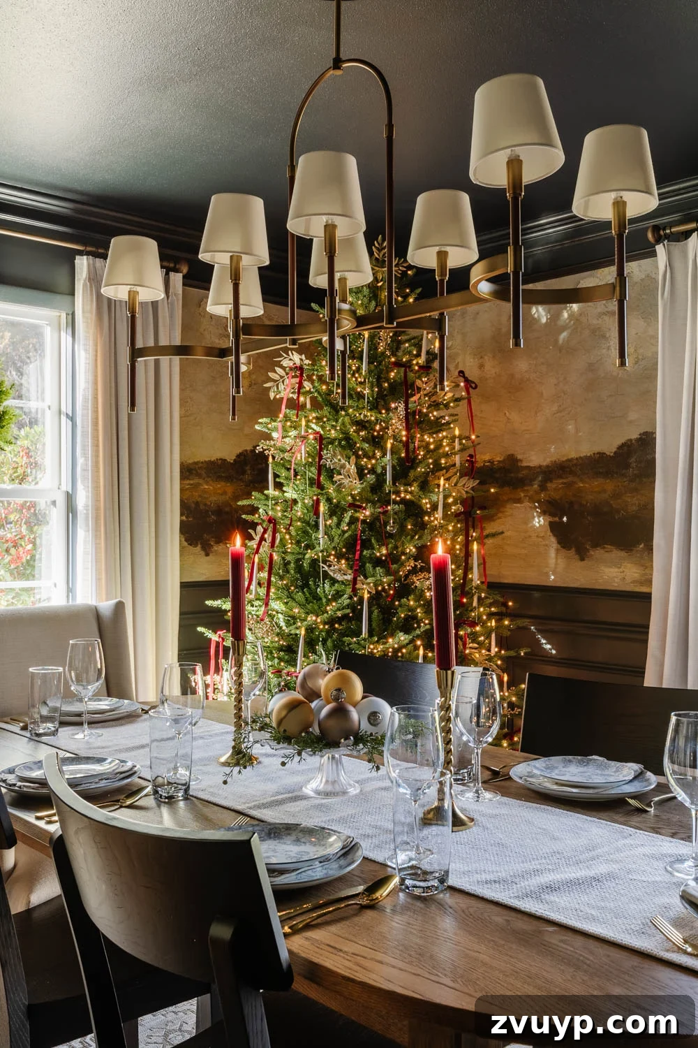 A Modern Colonial Christmas: 2024 Home Inspiration 19 modern traditional colonial christmas home tour dining room with festive centerpiece