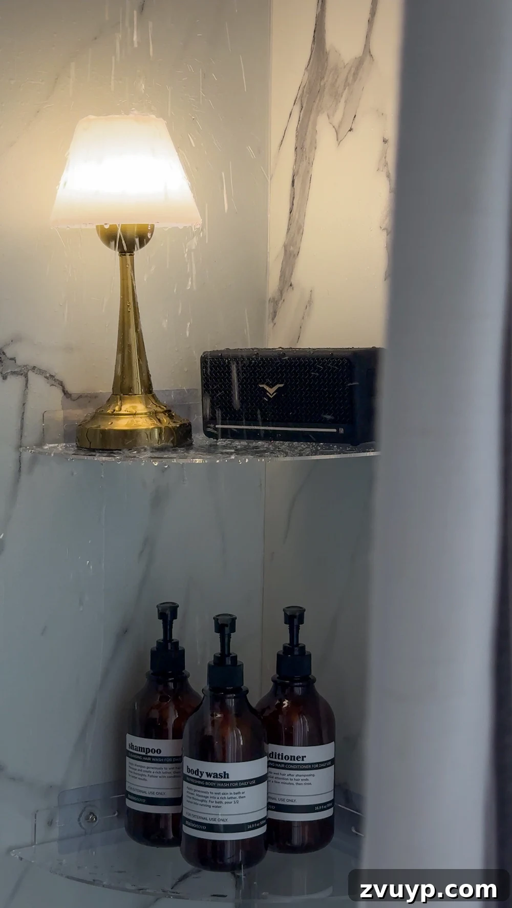 Elevate Your Shower Experience with These Trending Cozy Lights 3 waterproof lamp on shower shelf with bluetooth speaker for a cozy bathroom