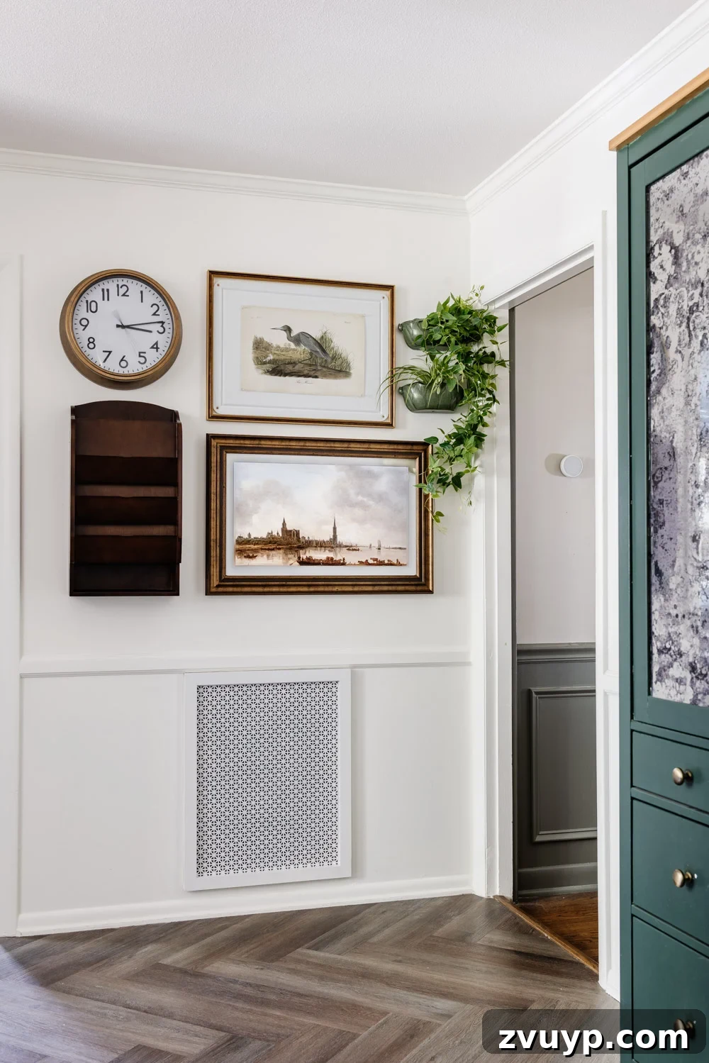 Skylight Calendar: What Our Family Loved and Didn't 3 The Skylight Calendar Max integrated seamlessly into an art gallery wall in a family kitchen, displaying a stylish digital art piece when not actively showing calendar information, serving as a family command center.