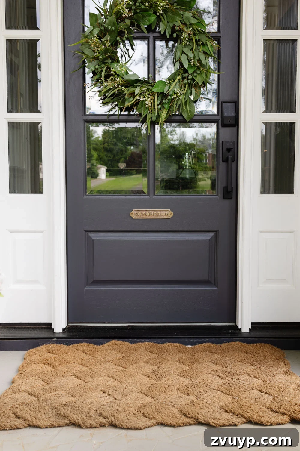 no soliciting brass sign on door