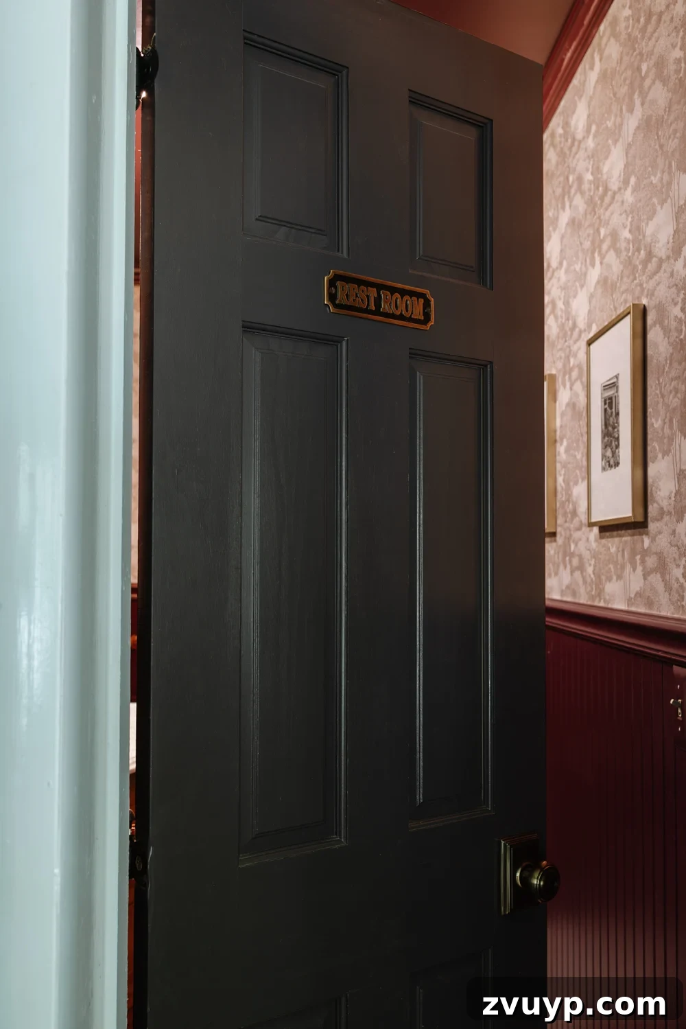 antique brass bathroom sign on door at home
