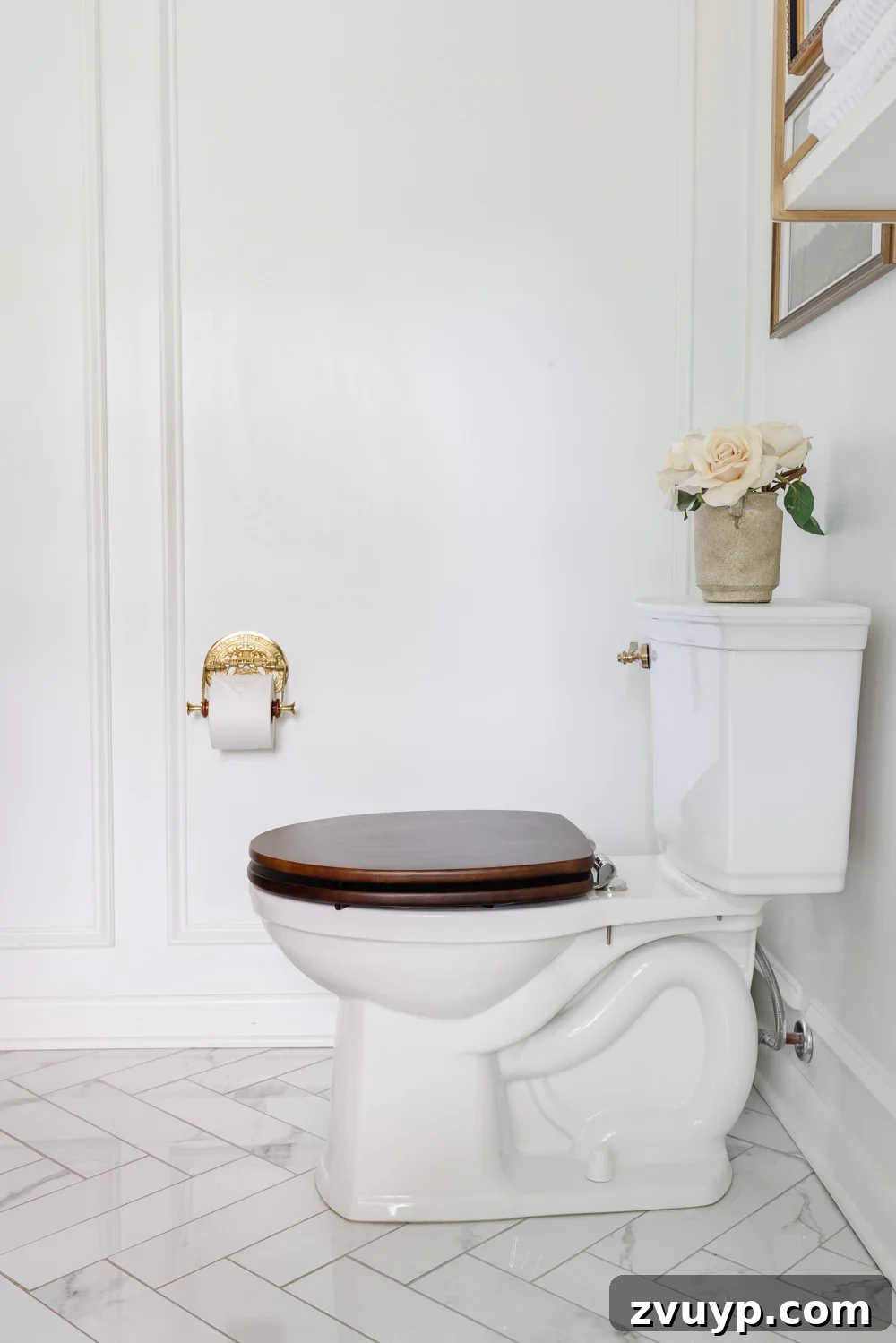 toilet with wooden seat and brass toilet paper holder