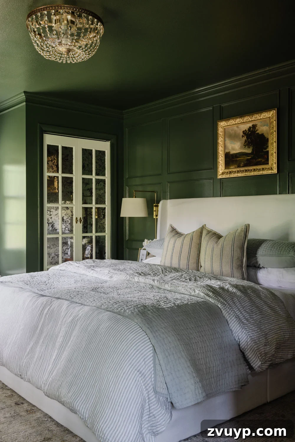 Before You Buy the Viral Crystal Fandelier Read This 4 A viral fandelier with crystal accents in a stylish green bedroom setting