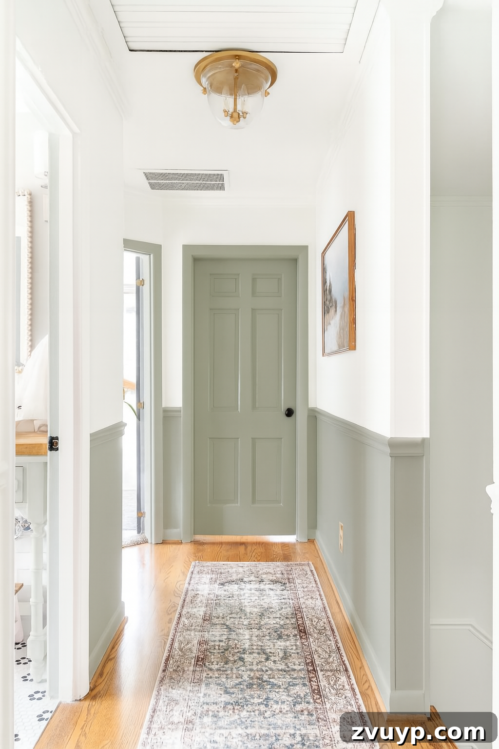 From Concept to Hallway Reality 5 AI-generated visualization of a hallway with Sherwin Williams Willowleaf wainscoting and white walls, showing decor elements.