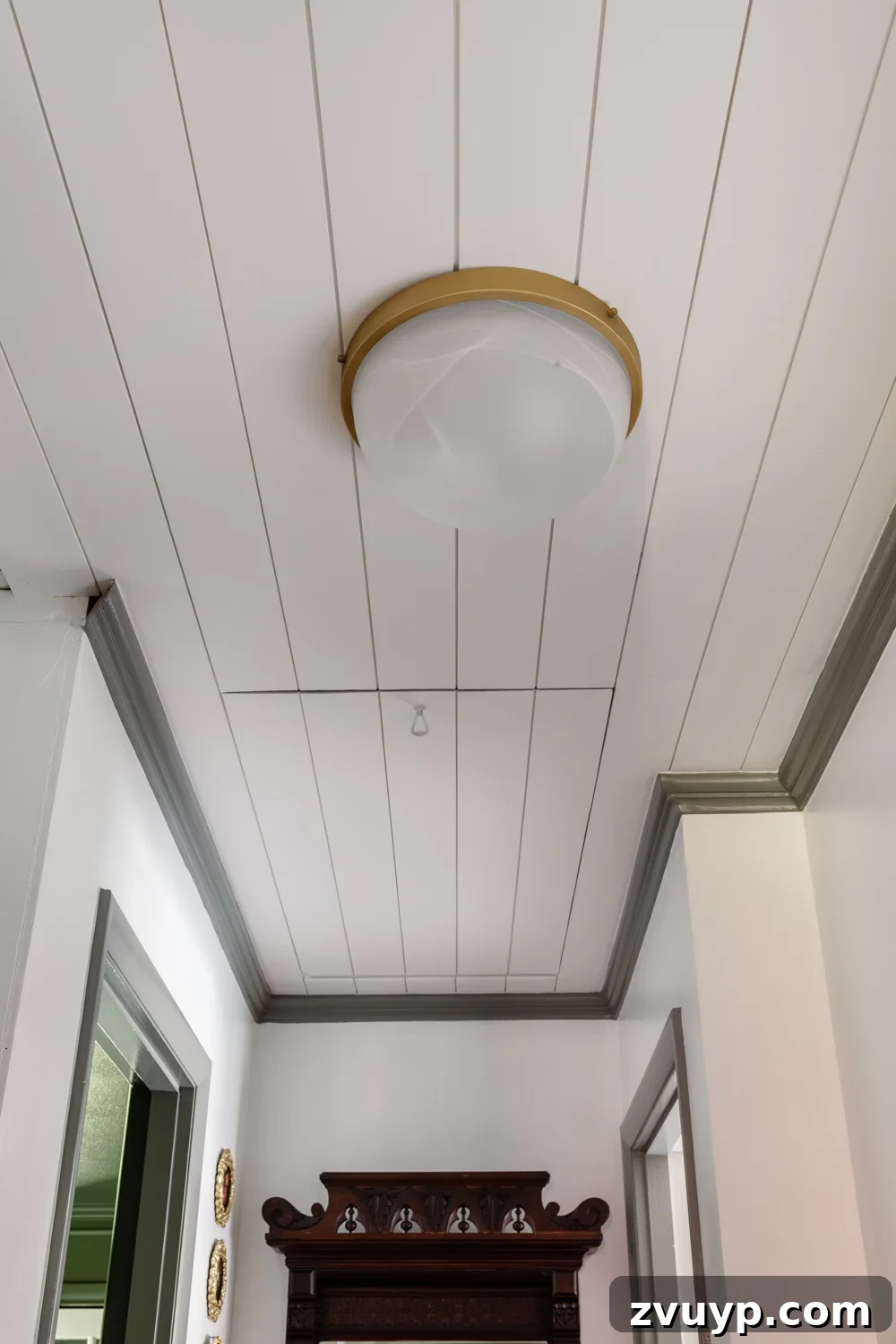 Our Living Room Redesign The Vision and The Blueprint 3 tongue and groove ceiling with hidden attic door