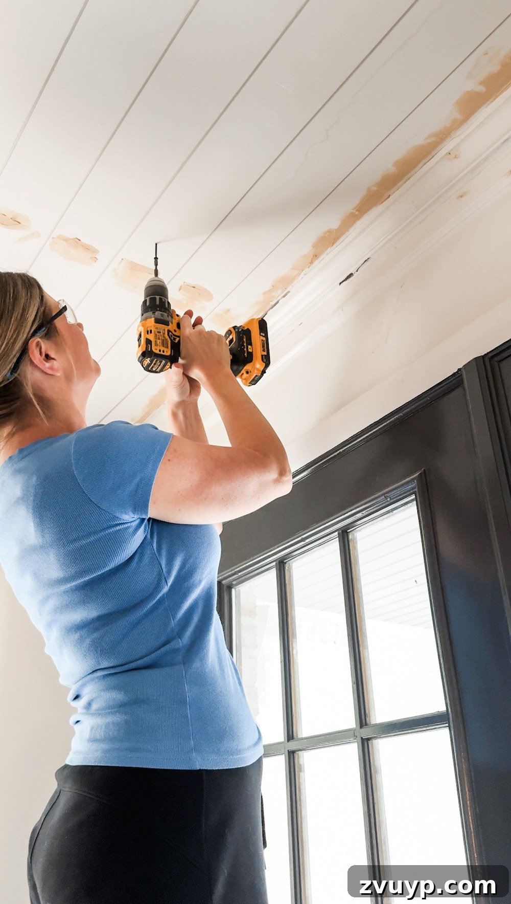 Transform Your Ceiling: Shiplap and Crown Molding Project 9 DIY shiplap ceiling with light fixture cutout