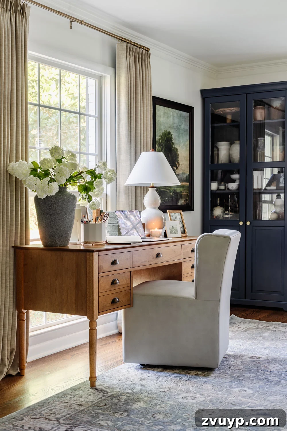 100+ Speedy Home Upgrades for Your Long Weekend Refresh 9 Home office desk with a laptop facing a window, promoting productivity