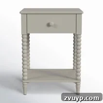 Clever Nightstands: Elevating Tiny Bedrooms with Smart Designs 11 Elegant slim nightstand with a unique base