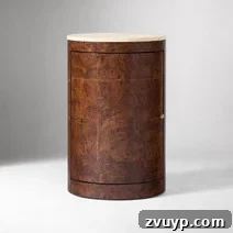 Clever Nightstands: Elevating Tiny Bedrooms with Smart Designs 24 Slim bedside table with a sleek black finish and brass accents