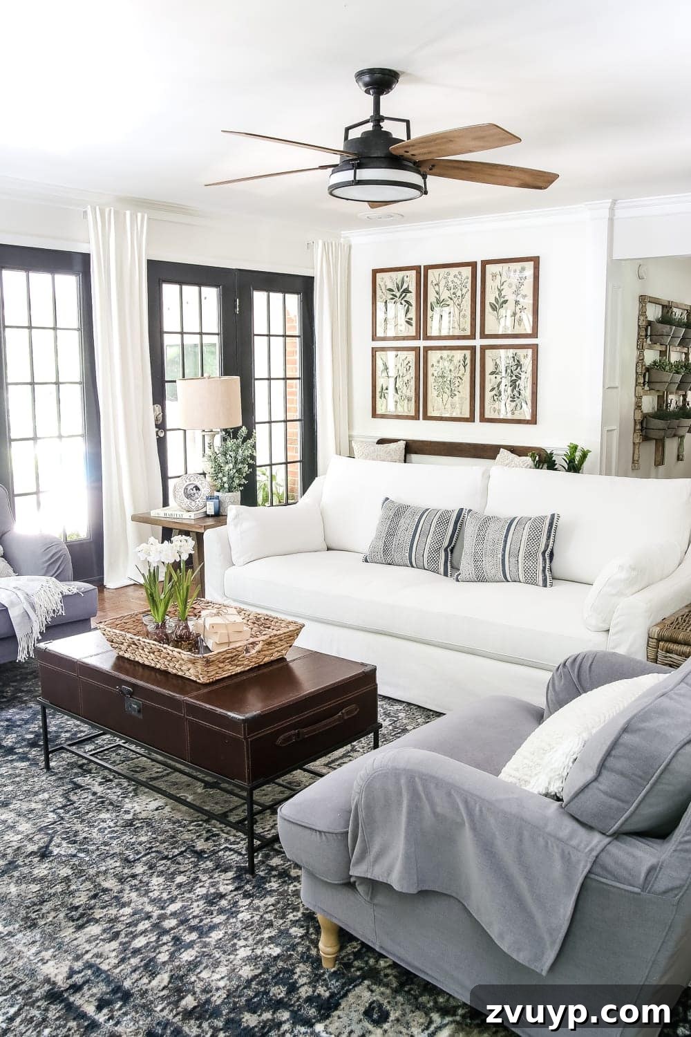 Eight Years Shaping Our Living Room 4 Modern farmhouse living room decor with rustic furniture and neutral tones