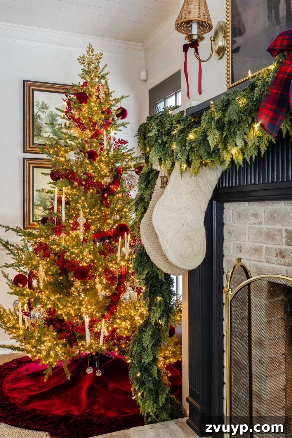 Achieving Ralph Lauren Christmas Elegance on a Dime 13 Ralph Lauren Christmas decorating ideas on a budget - cable knit stockings hung on a navy blue mantel with classic garland and candles