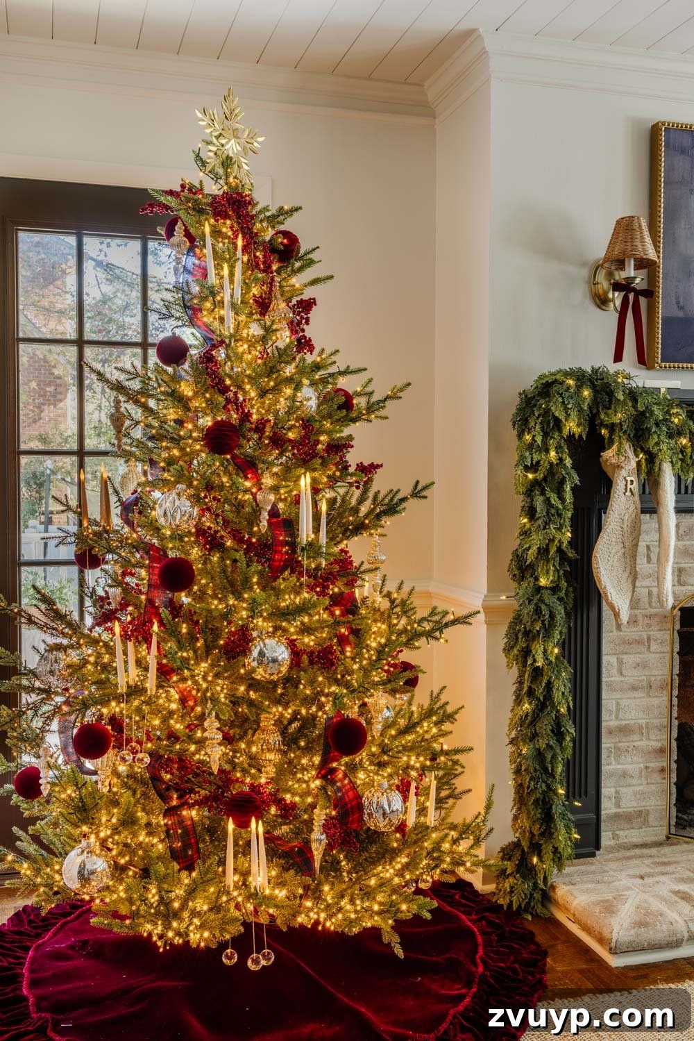 Achieving Ralph Lauren Christmas Elegance on a Dime 15 Ralph Lauren Christmas tree decorating ideas on a budget - classic Christmas tree with plaid ribbon and equestrian art on a Samsung Frame TV