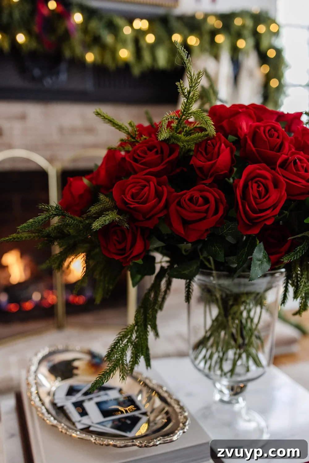 Achieving Ralph Lauren Christmas Elegance on a Dime 3 Ralph Lauren Christmas decorating ideas on a budget - red roses mixed with winter stems in an elegant vase