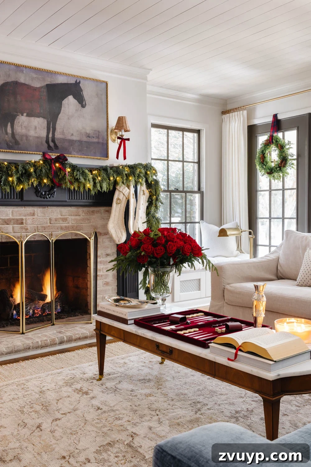 Achieving Ralph Lauren Christmas Elegance on a Dime 7 Ralph Lauren Christmas decorating ideas on a budget - living room with navy mantel and classic holiday decor