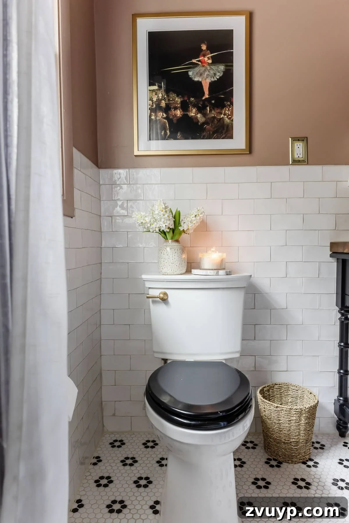 Transform Your Guest Bathroom: Amenities for Ultimate Visitor Comfort 8 toilet with black toilet lid and subway tile with pink bathroom walls