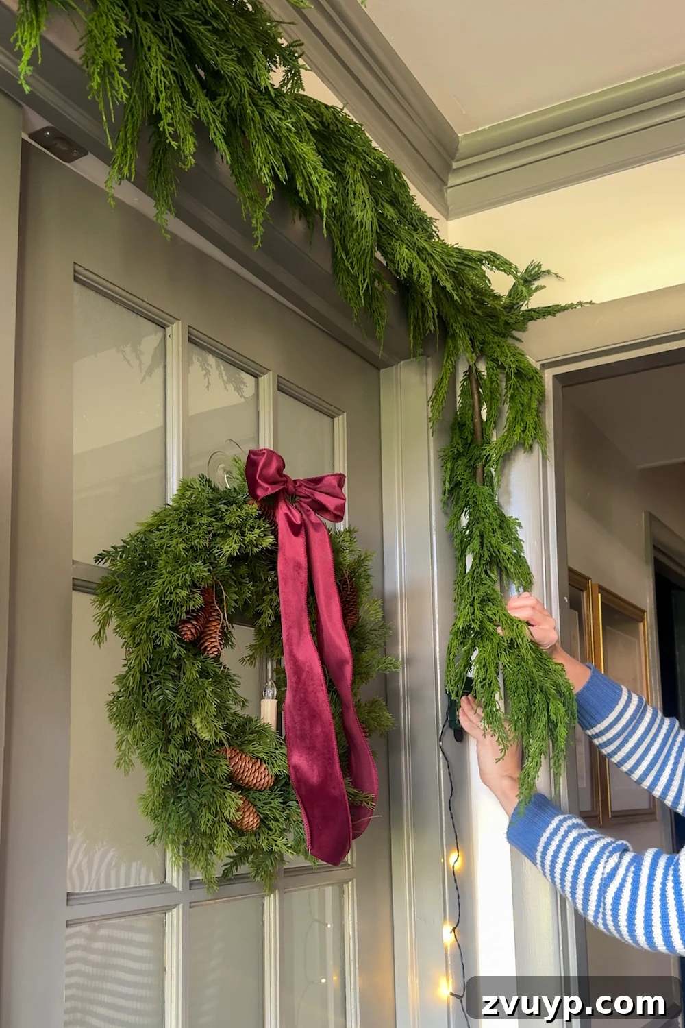 Hang Garland Over Any Doorway Damage-Free and Custom 11 how to hang doorway garland inside with no damage for Christmas