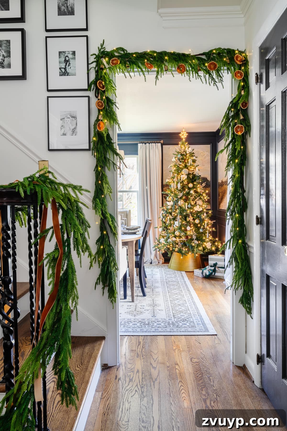 Hang Garland Over Any Doorway Damage-Free and Custom 20 Traditional doorway garland with gold ornaments and warm lights for elegant Christmas decor.